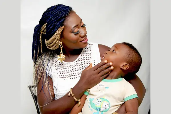 A MOTHER WITH KID OF NIGERIAN ORIGIN